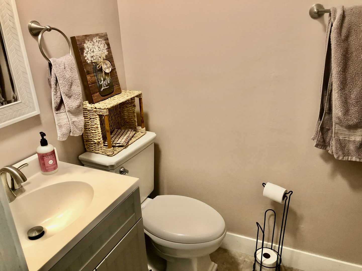 12907 Barber Greene Road Sycamore, IL 60178 - Photo 30 of 42 a bathroom with a sink a toilet and mirror