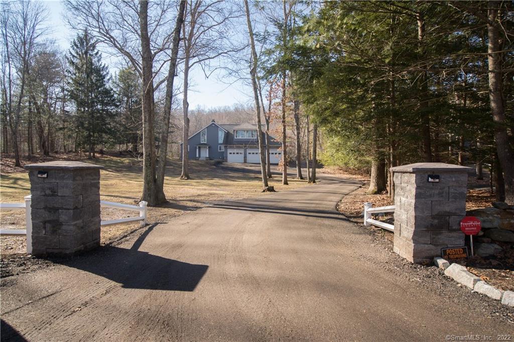 93 Bamforth Road Haddam, CT 06438 - Photo 1 of 1 a view of a patio with table and chairs and a barbeque