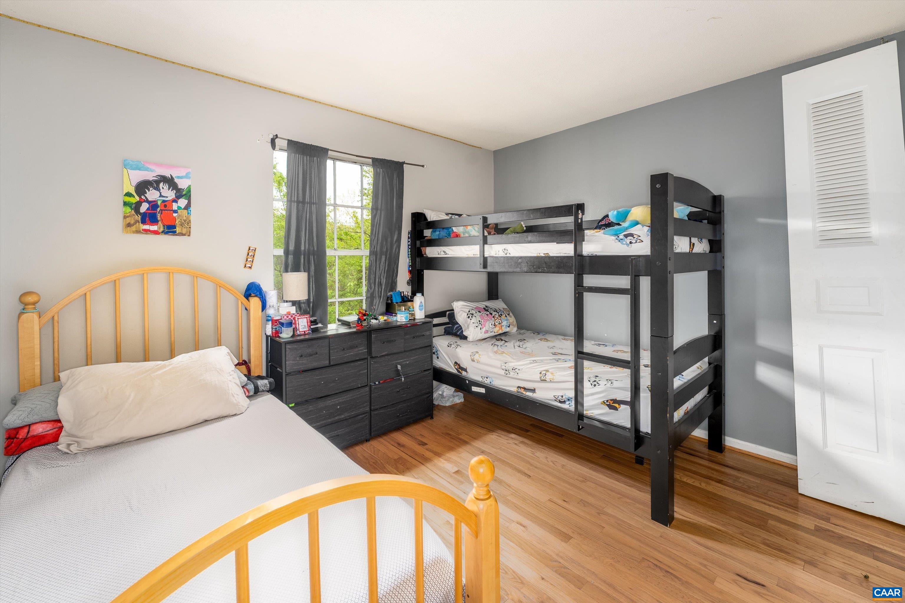 2517 Hydraulic Road, Unit 73 Charlottesville, VA 22901 - Photo 18 of 22 a bed room with furniture and a window