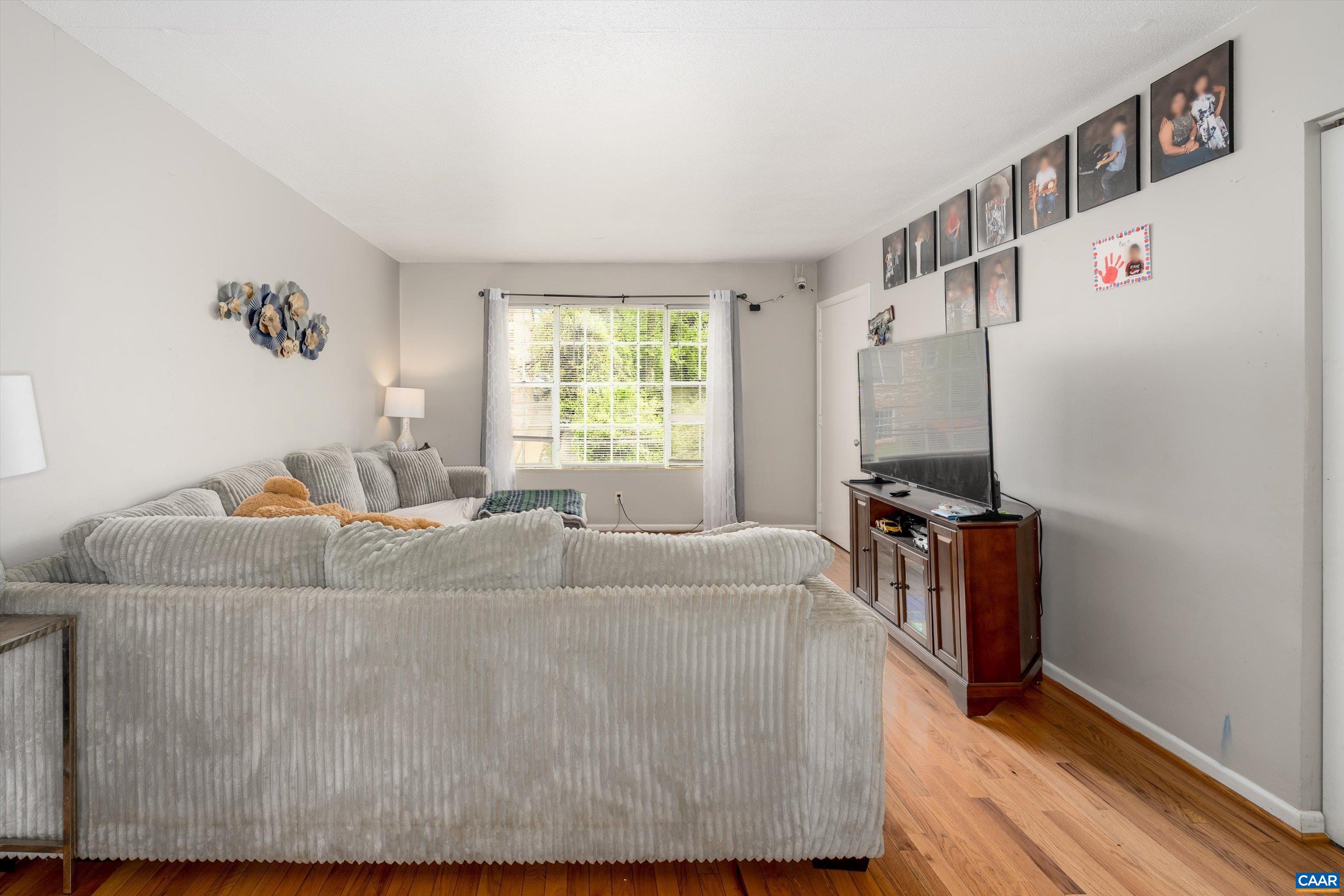 2517 Hydraulic Road, Unit 73 Charlottesville, VA 22901 - Photo 6 of 22 a living room with furniture and a window
