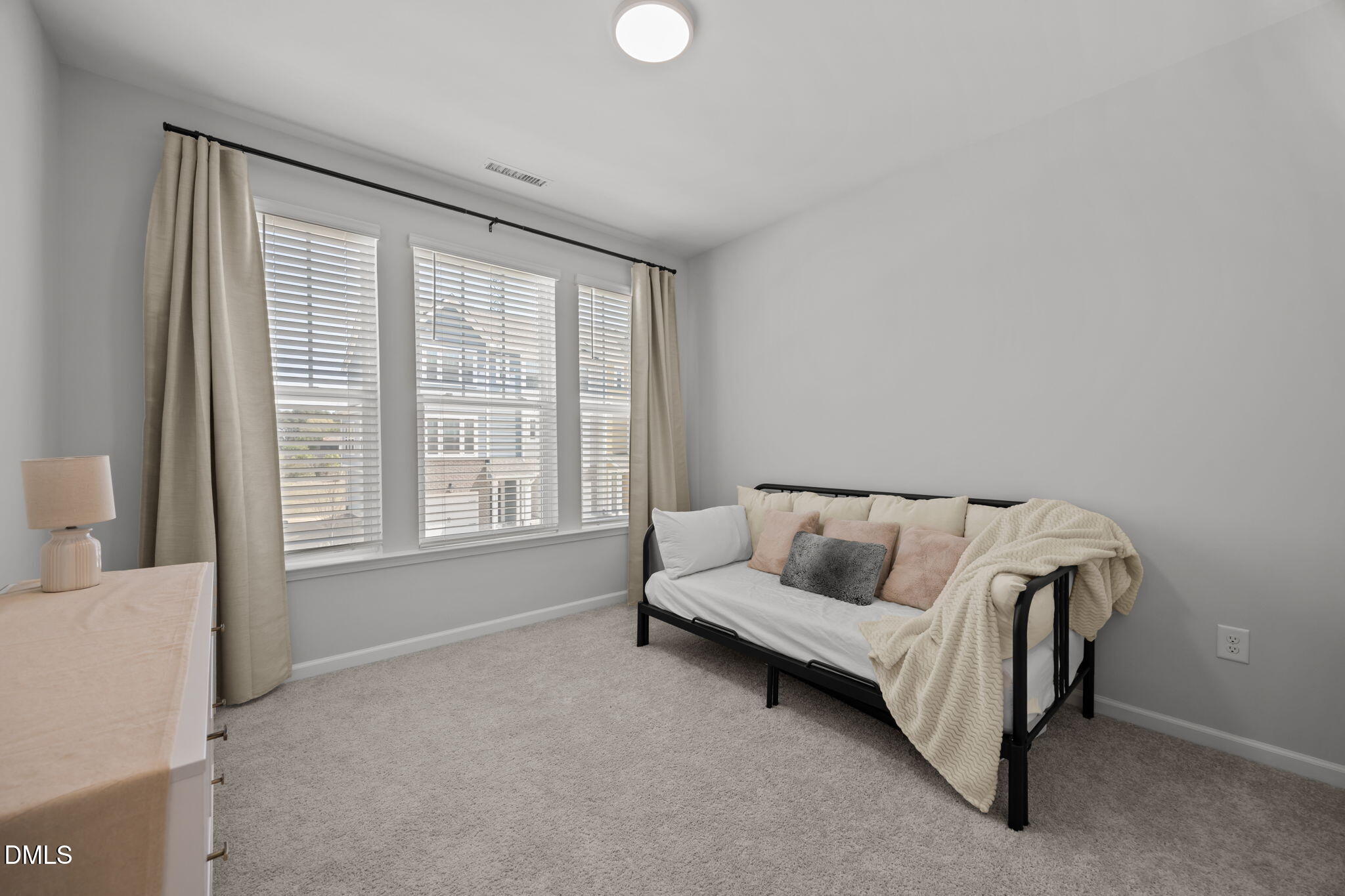 3013 Worthy Way Durham, NC 27703 - Photo 27 of 38 a living room with furniture and a large window