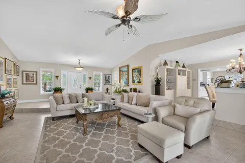 a kitchen with a table and chairs in it