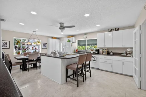 a bathroom with a toilet sink and shower