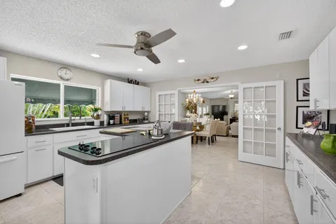 a bathroom with a sink a mirror and a shower