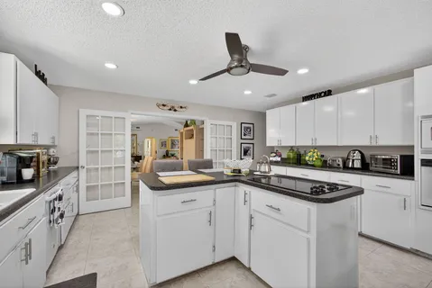 a outdoor space with lots of potted plants