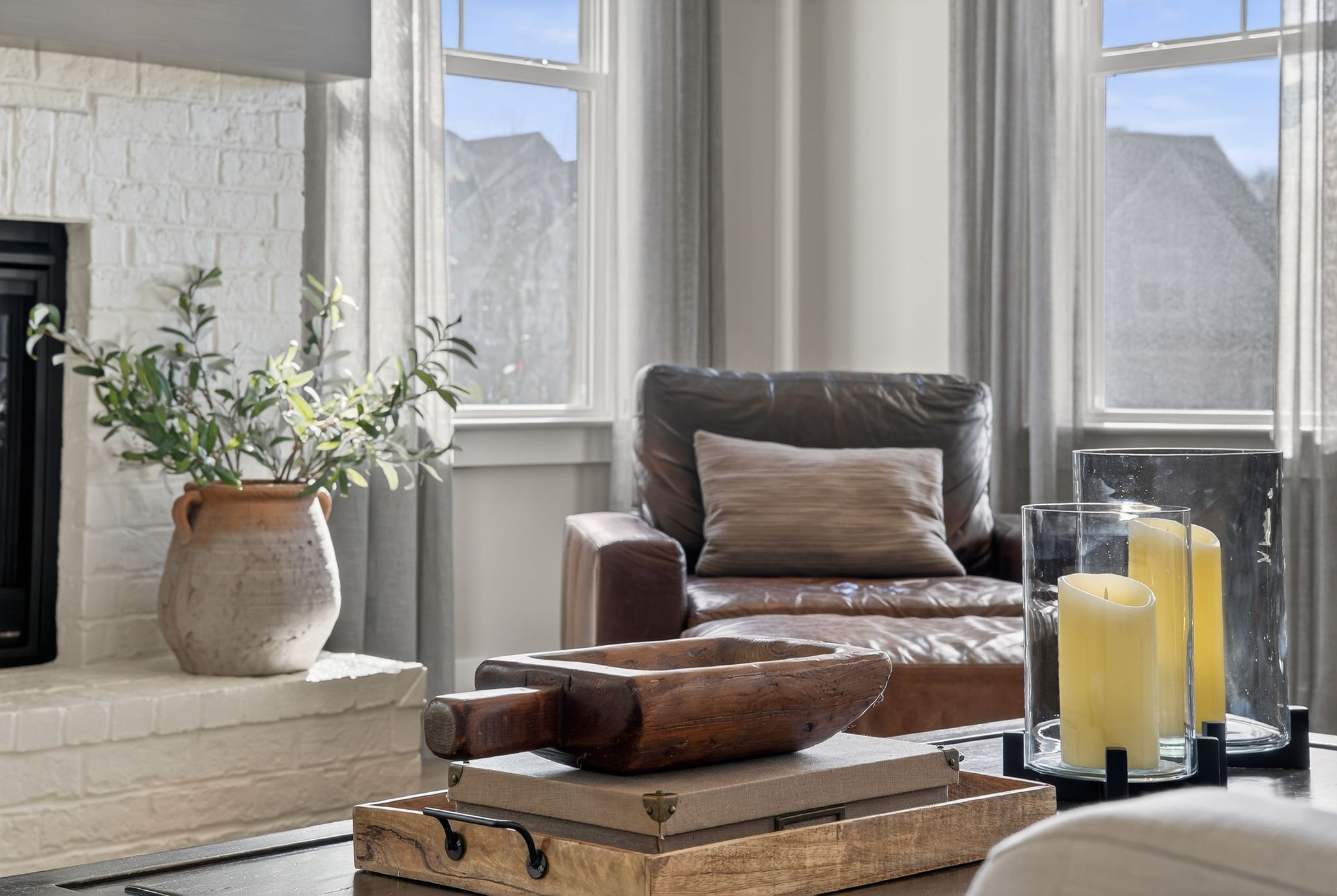998 Spruce Ridge Lane Spring Hill, TN 37174 - Photo 18 of 82 a living room with furniture and a potted plant