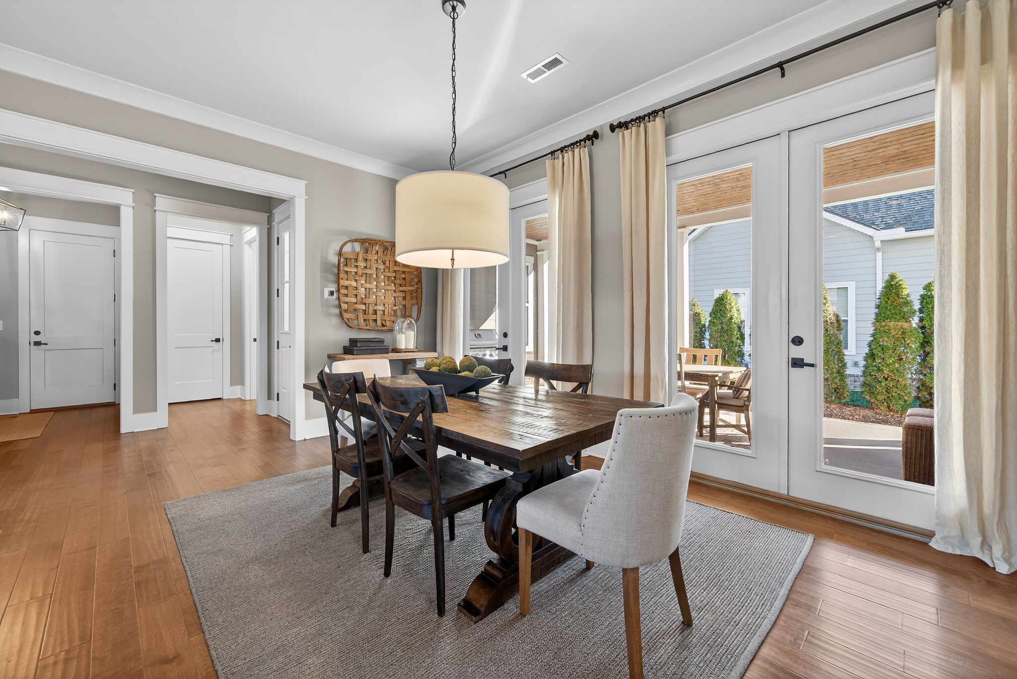 998 Spruce Ridge Lane Spring Hill, TN 37174 - Photo 21 of 82 a view of a dining room with furniture window and wooden floor