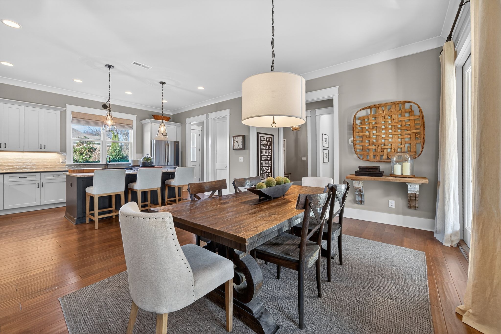 998 Spruce Ridge Lane Spring Hill, TN 37174 - Photo 22 of 82 a view of a dining room with furniture window and wooden floor