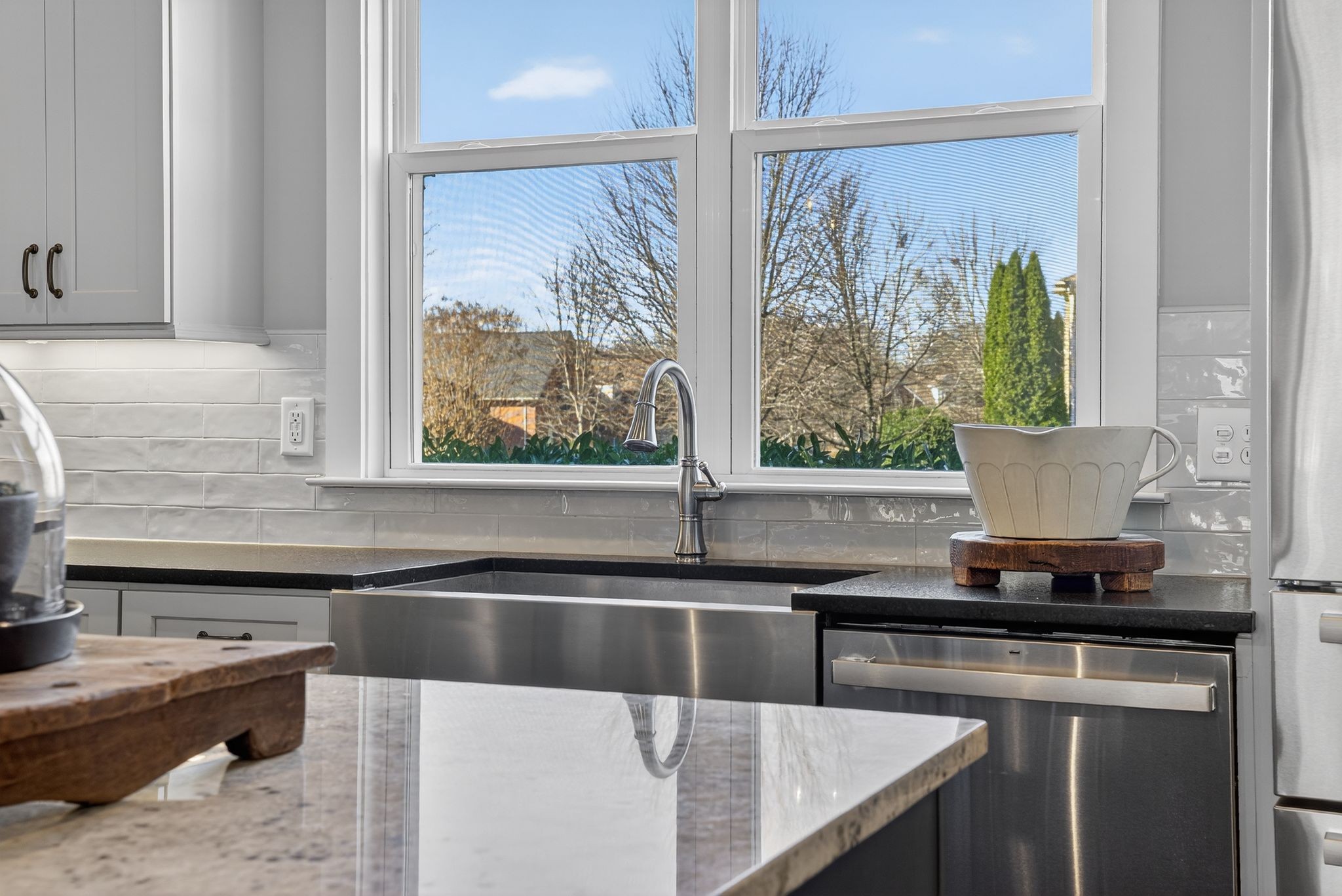 998 Spruce Ridge Lane Spring Hill, TN 37174 - Photo 28 of 82 a kitchen with granite countertop a sink and a counter top space