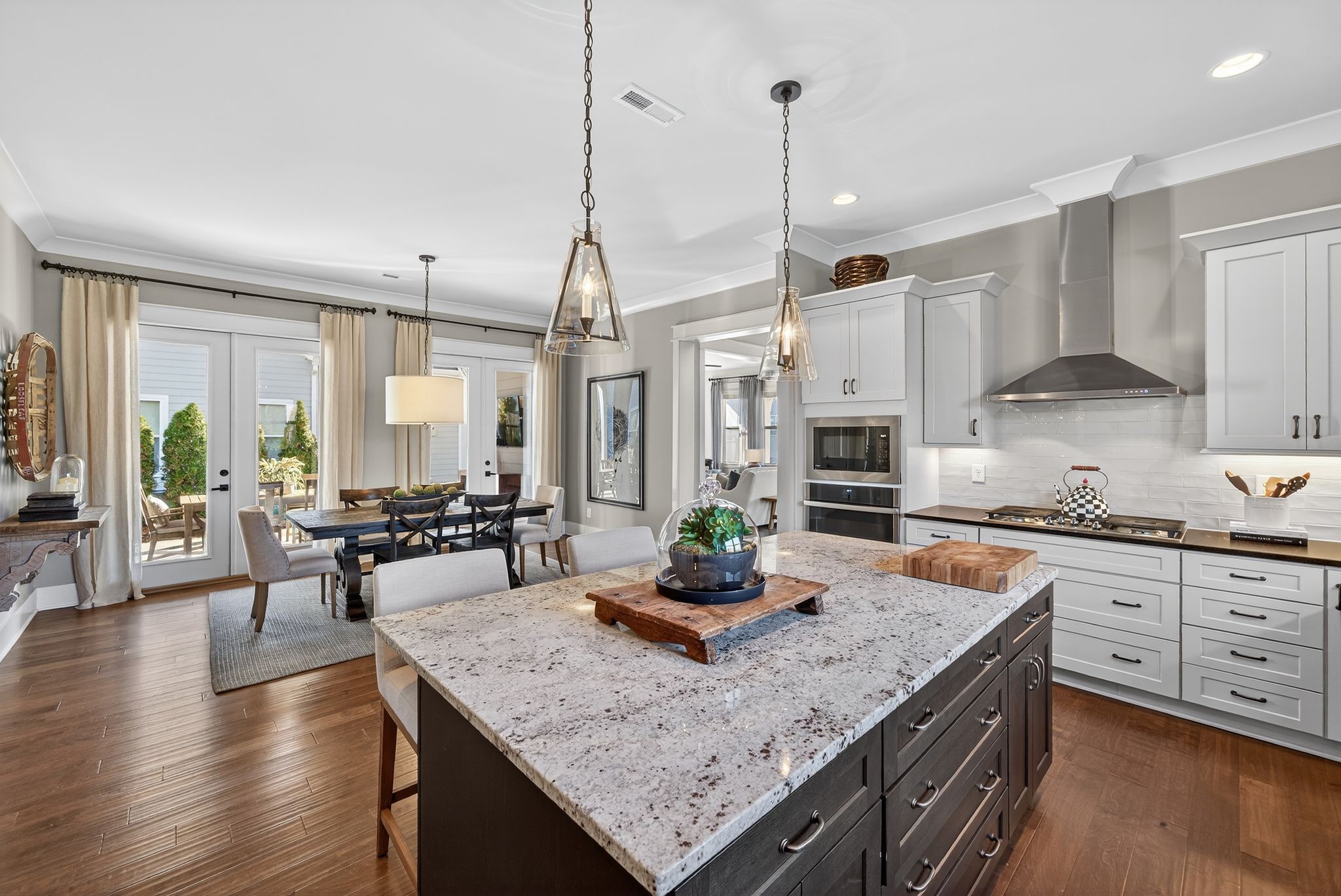 998 Spruce Ridge Lane Spring Hill, TN 37174 - Photo 33 of 82 a kitchen with center island table and chairs