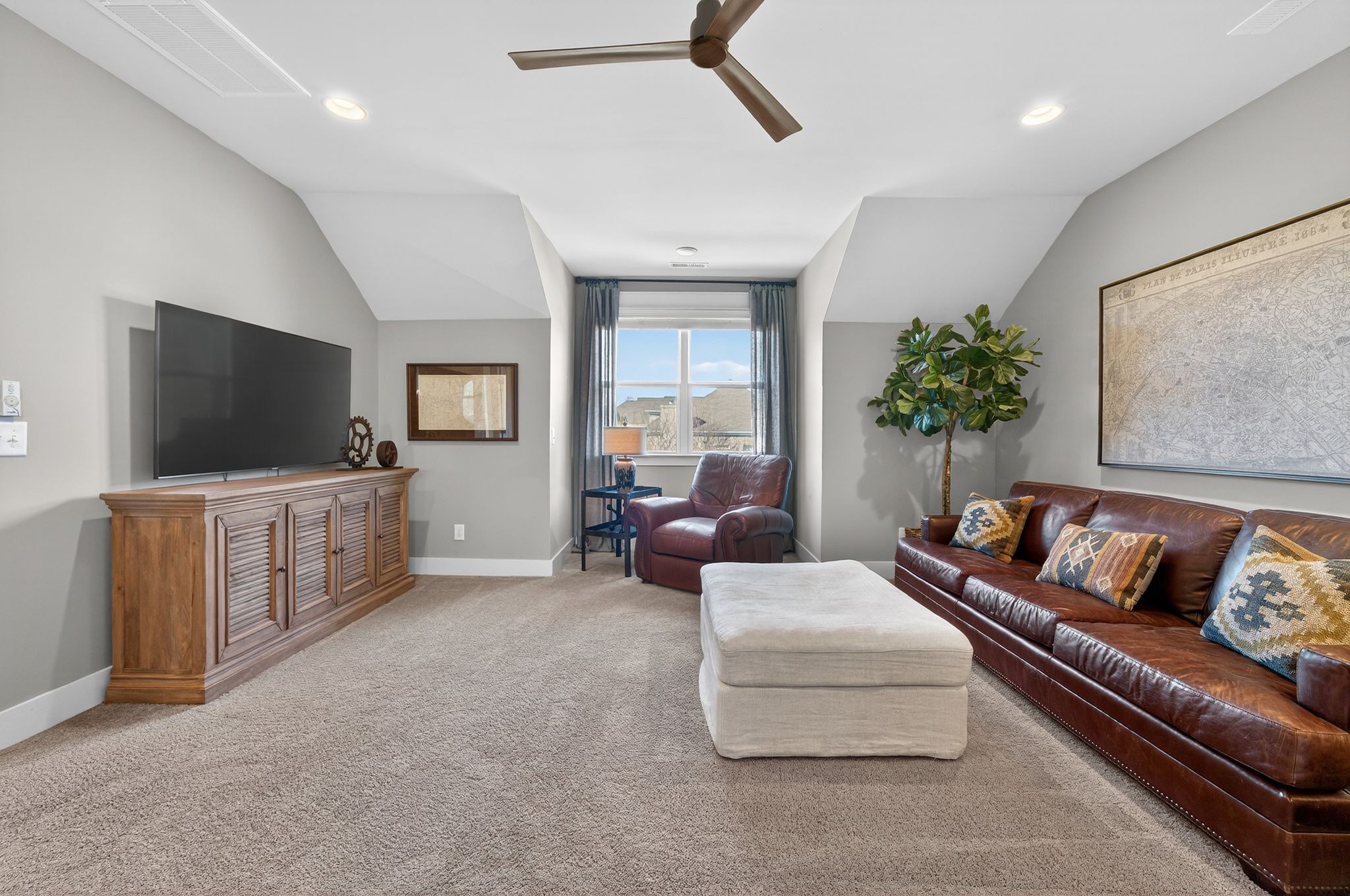 998 Spruce Ridge Lane Spring Hill, TN 37174 - Photo 58 of 82 a living room with furniture and a flat screen tv