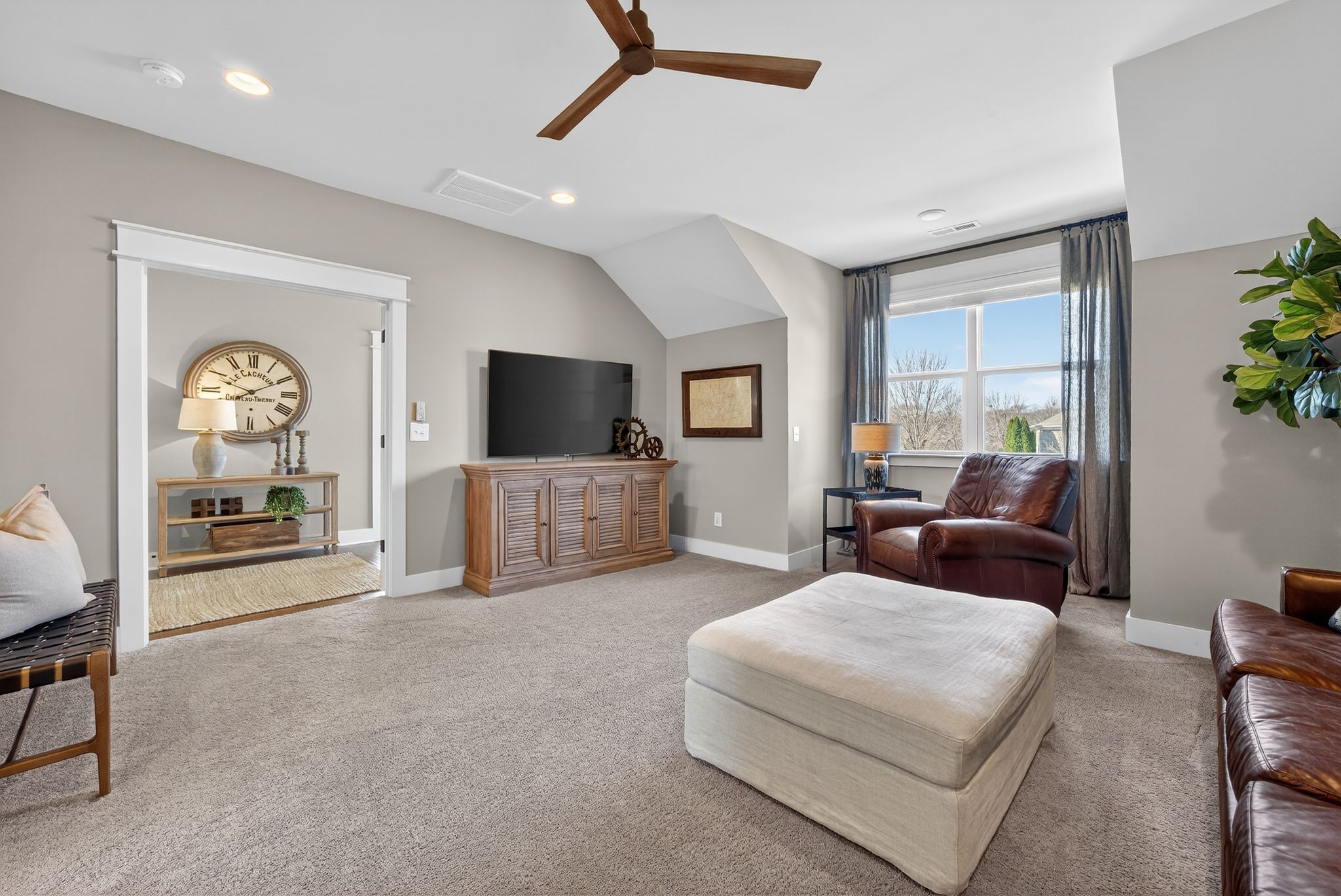 998 Spruce Ridge Lane Spring Hill, TN 37174 - Photo 59 of 82 a living room with furniture and a flat screen tv