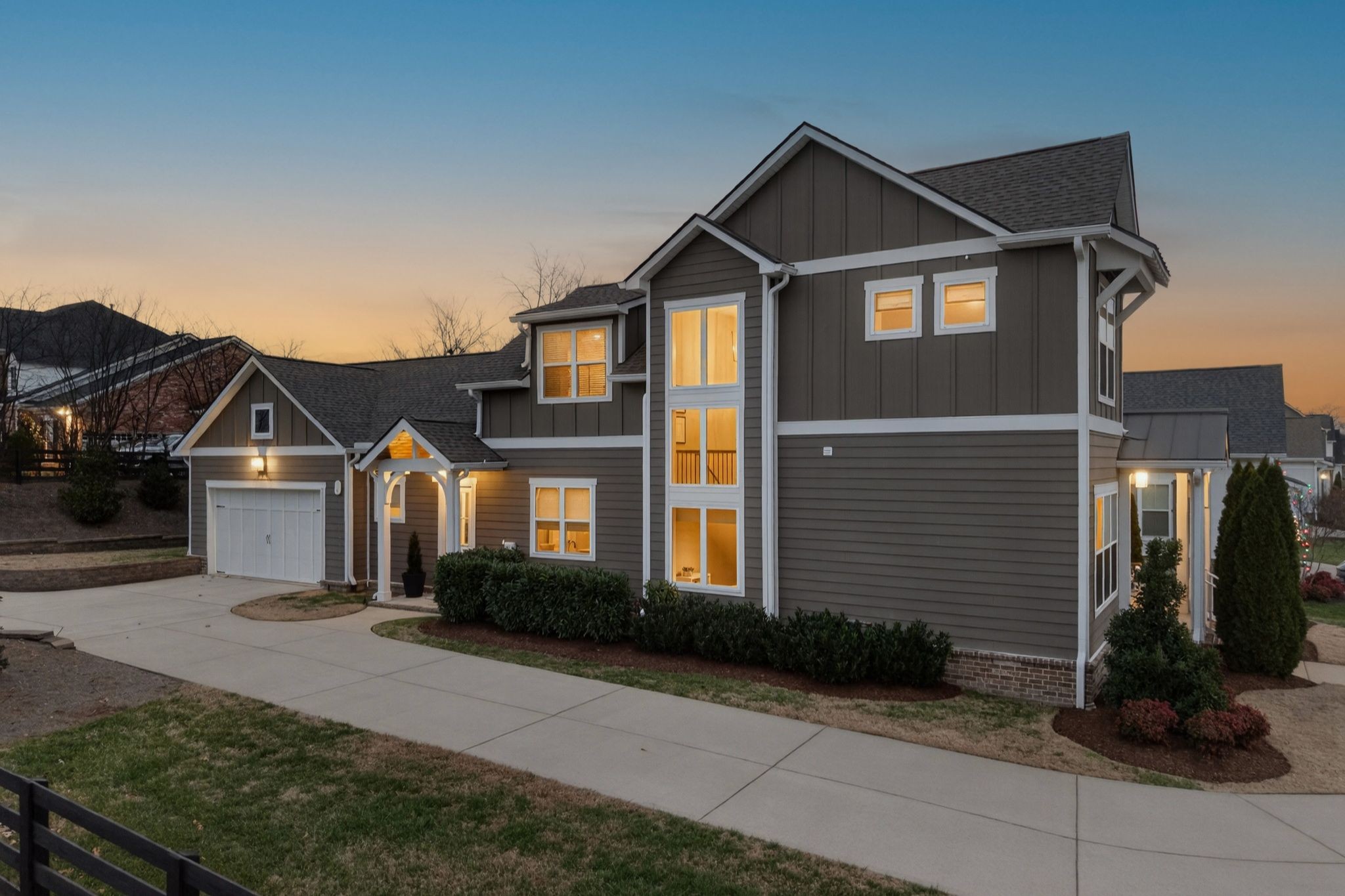998 Spruce Ridge Lane Spring Hill, TN 37174 - Photo 6 of 82 a front view of a house with a yard and garage