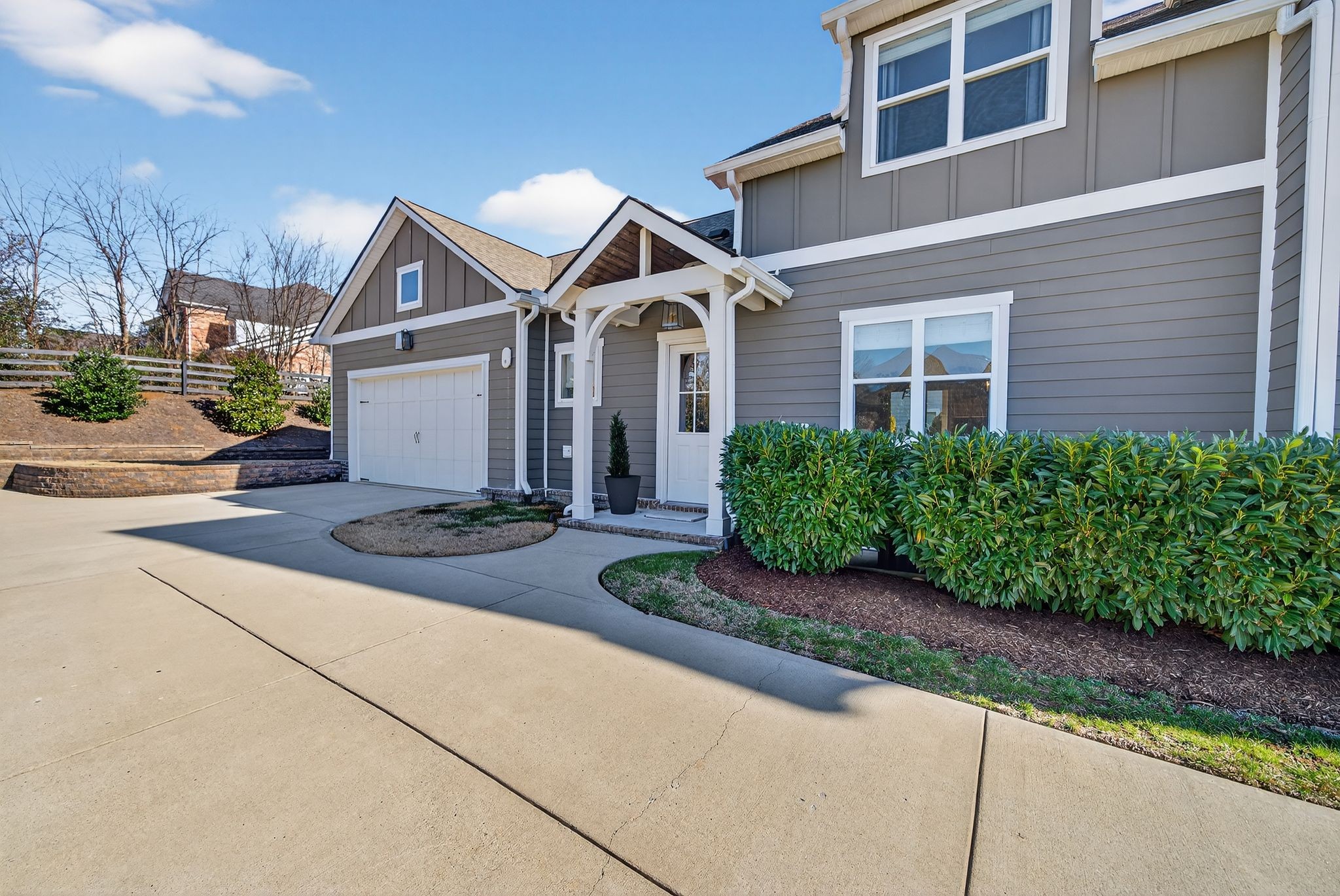 998 Spruce Ridge Lane Spring Hill, TN 37174 - Photo 70 of 82 a front view of a house with a yard and garage