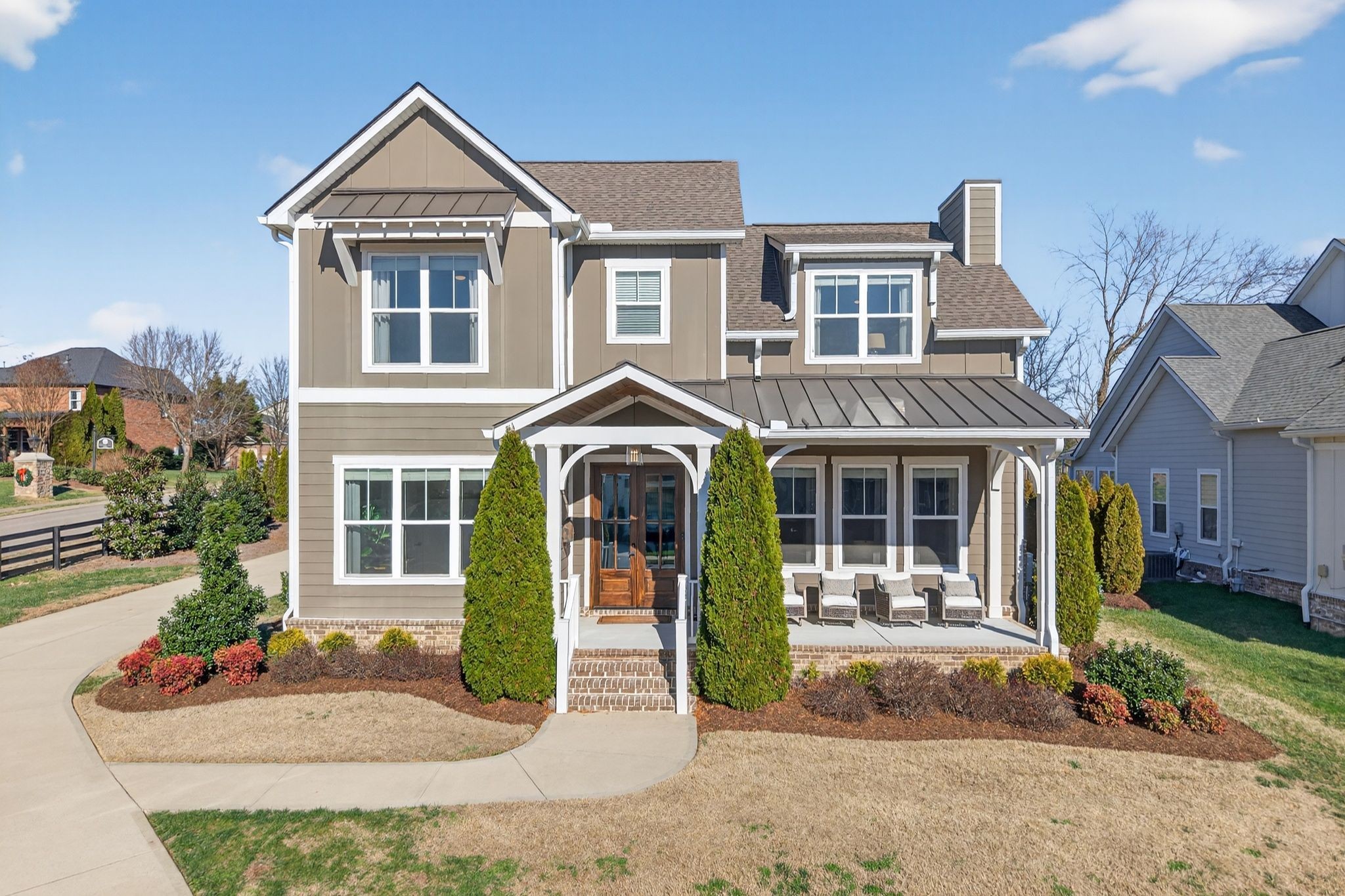 998 Spruce Ridge Lane Spring Hill, TN 37174 - Photo 7 of 82 a front view of a house with garden