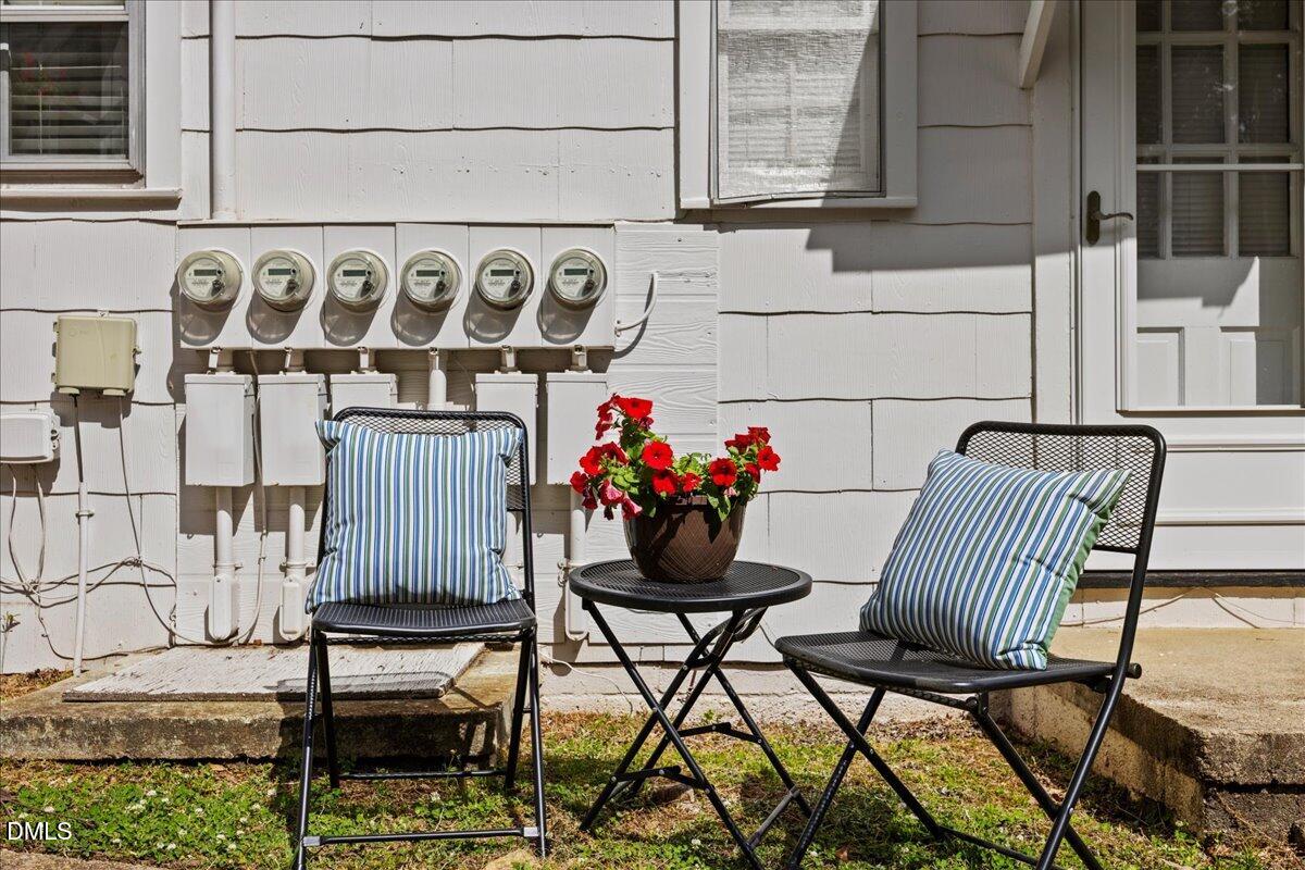 1627 Sutton Drive Raleigh, NC 27605 - Photo 22 of 33 a view of a chairs and table in the balcony