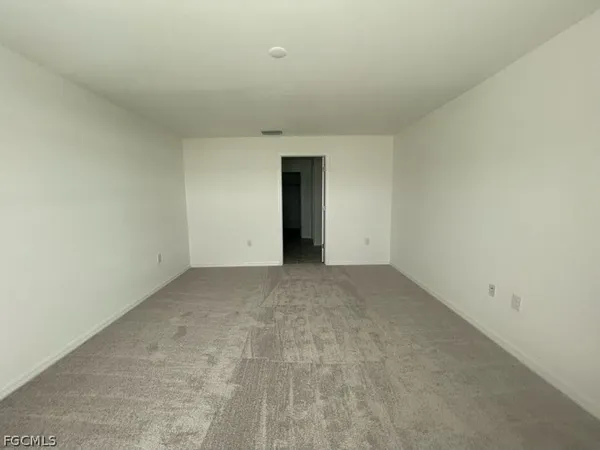 an empty room with an entryway
