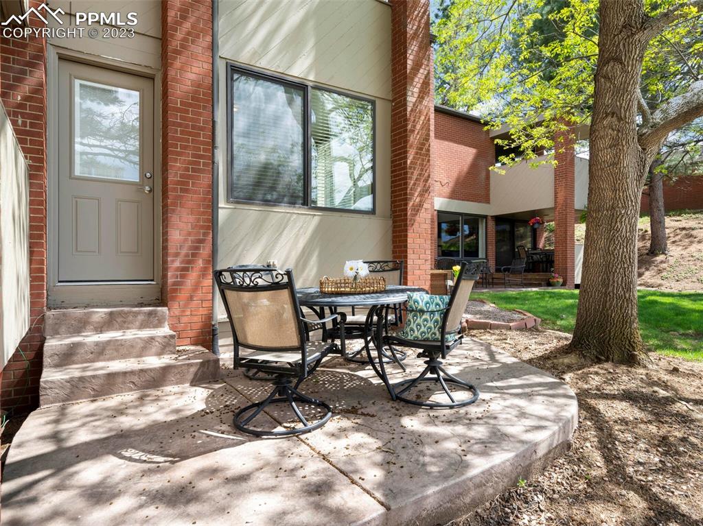 a view of a outdoor space with a patio and backyard