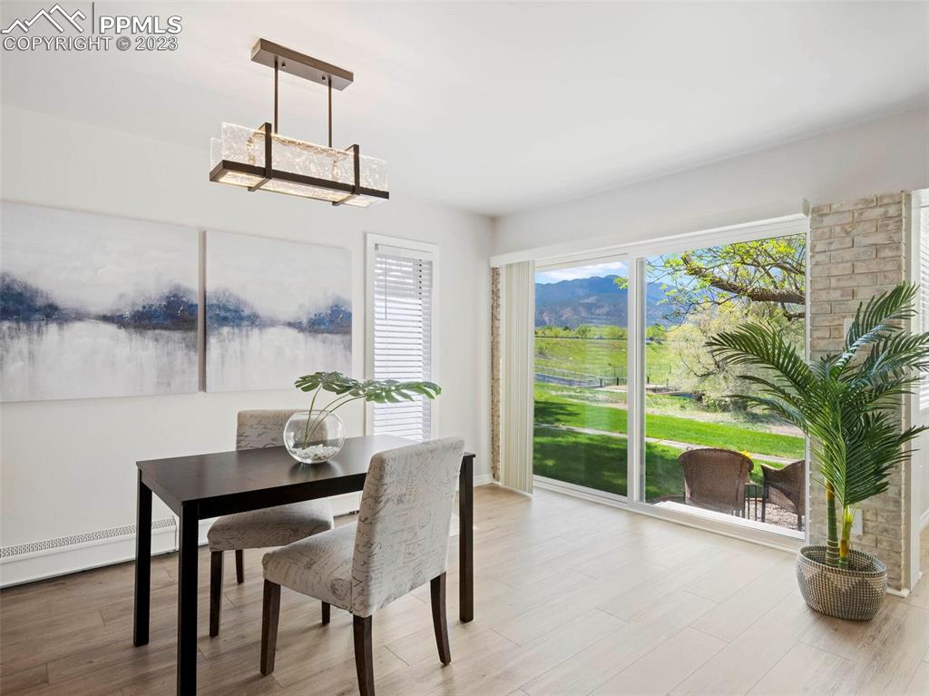 2622 Spring Grove Terrace Colorado Springs, CO 80906 - Photo 3 of 37 a dining room with furniture and window