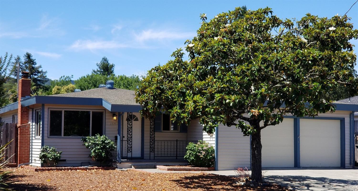 1663 Center Road Novato, CA 94947 - Photo 1 of 1 a front view of a house with garden