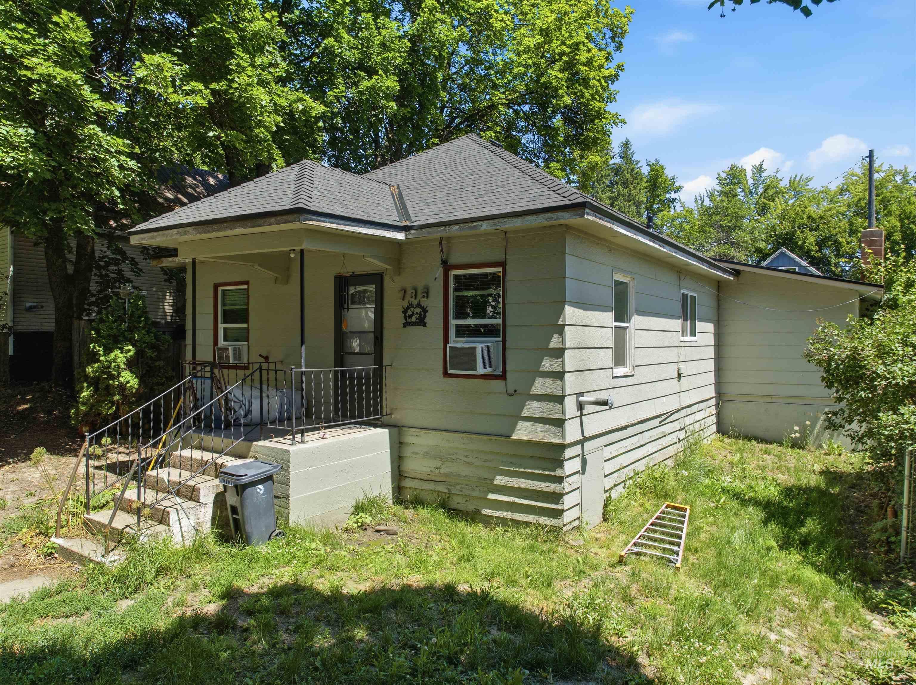 735 Oak Street Potlatch, ID 83855 - Photo 12 of 30 Single-story residence featuring light-colored siding and a dark shingle roof