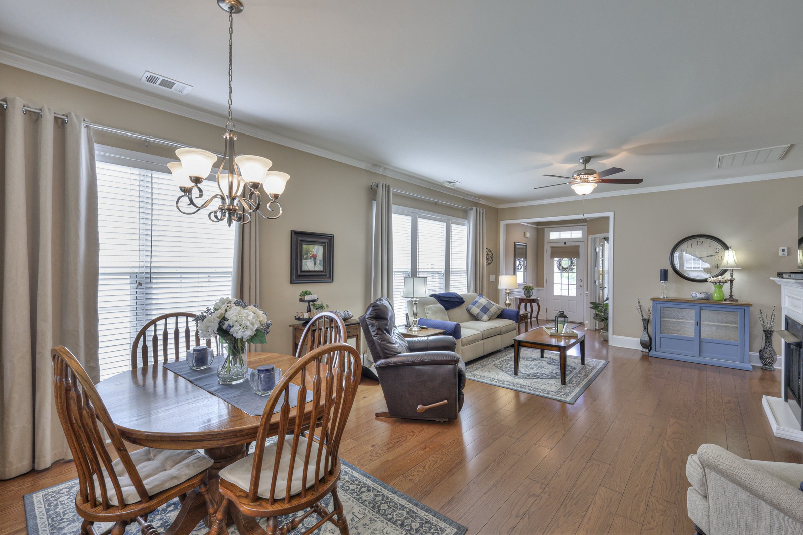 411 Independence Street Mount Juliet, TN 37122 - Photo 12 of 39 a living room with fireplace furniture and a chandelier