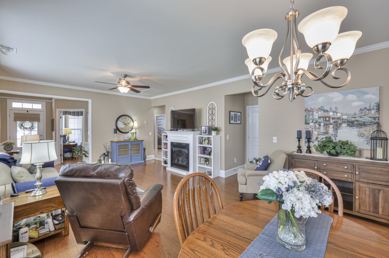 411 Independence Street Mount Juliet, TN 37122 - Photo 13 of 39 a living room with fireplace furniture and a wooden floor
