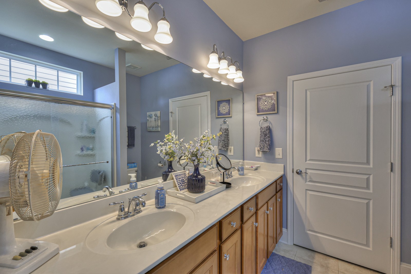 411 Independence Street Mount Juliet, TN 37122 - Photo 22 of 39 a bathroom with a double vanity sink and a mirror