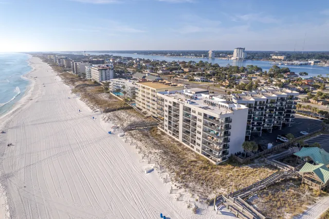a view of a tall building with many windows