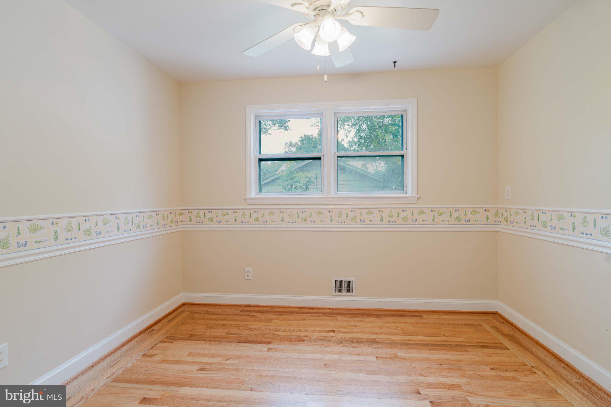 10200 Duvawn Place Silver Spring, MD 20902 - Photo 11 of 42 Bright and airy room with charm.