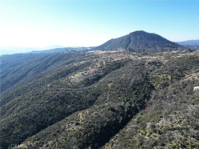 a view of a house with a mountain
