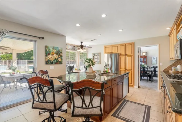 a view of a dining room with furniture window and outside view