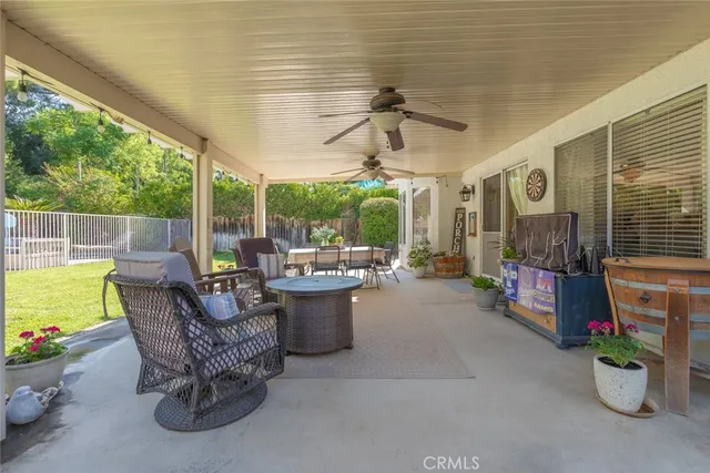 a front view of house with yard and outdoor seating