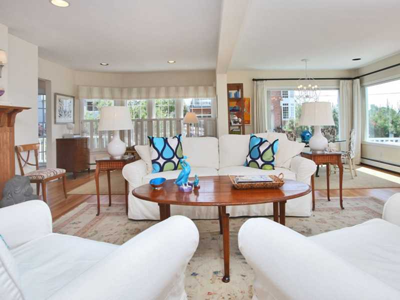 33 Ensign Road Rowayton, CT 06853 - Photo 8 of 16 a living room with furniture and a large window