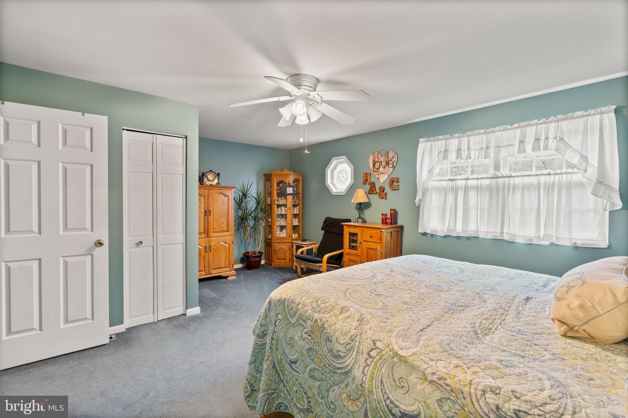 14 Stable Gate Court Perry Hall, MD 21128 - Photo 11 of 46 a bed room with a bed and a large window