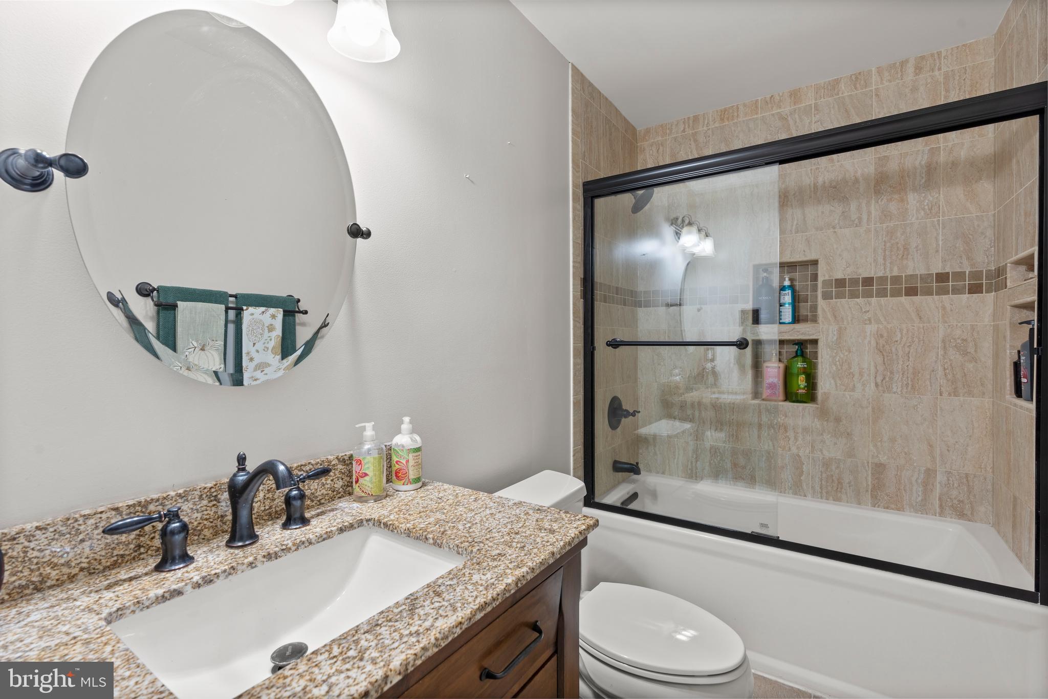 14 Stable Gate Court Perry Hall, MD 21128 - Photo 13 of 46 a bathroom with a granite countertop sink toilet and shower
