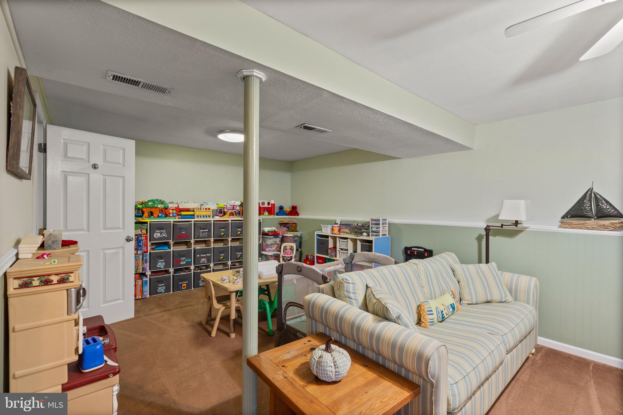 14 Stable Gate Court Perry Hall, MD 21128 - Photo 22 of 46 a living room with furniture and a book shelf
