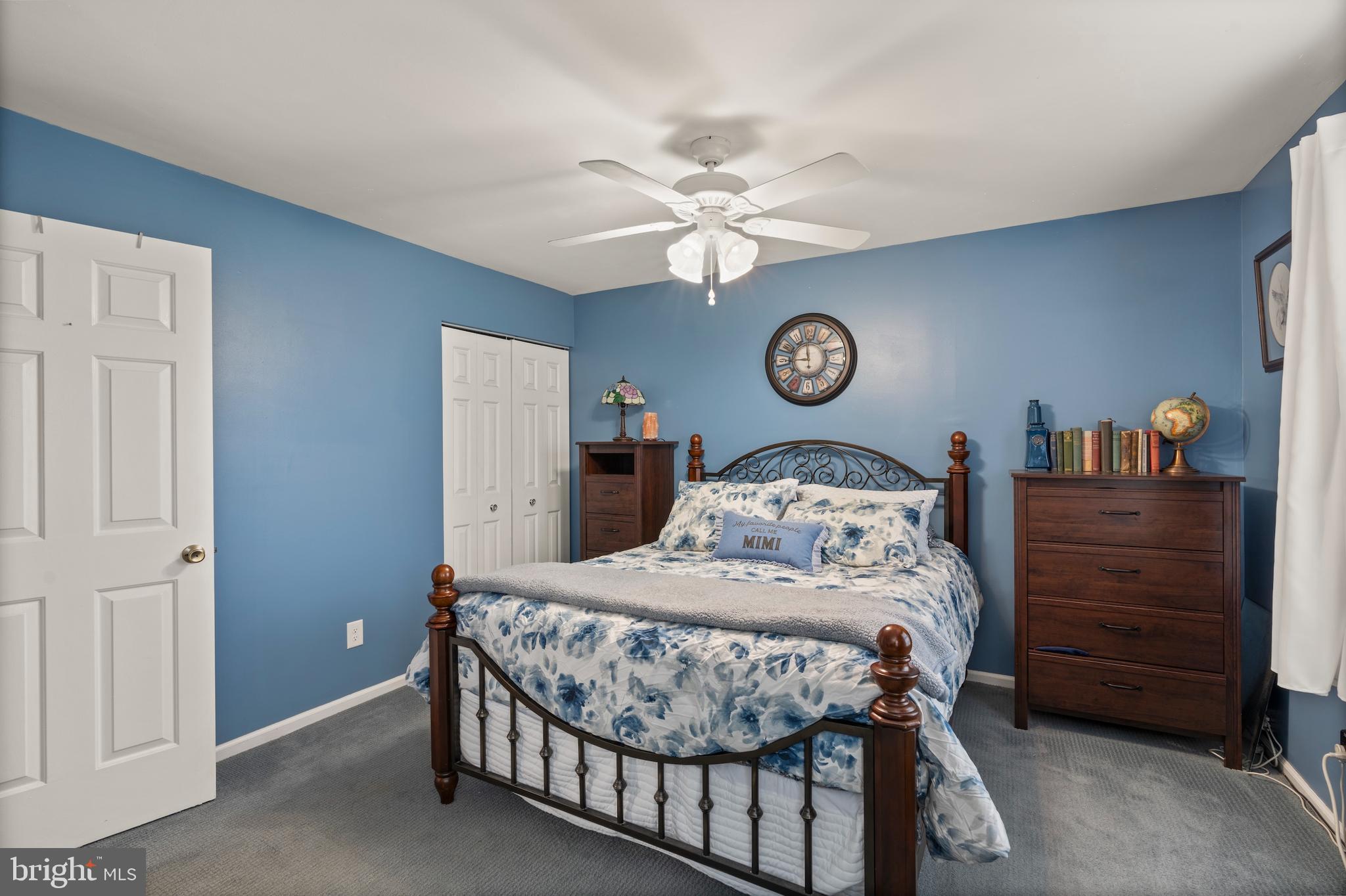 14 Stable Gate Court Perry Hall, MD 21128 - Photo 27 of 46 a bedroom with a bed and a table in it