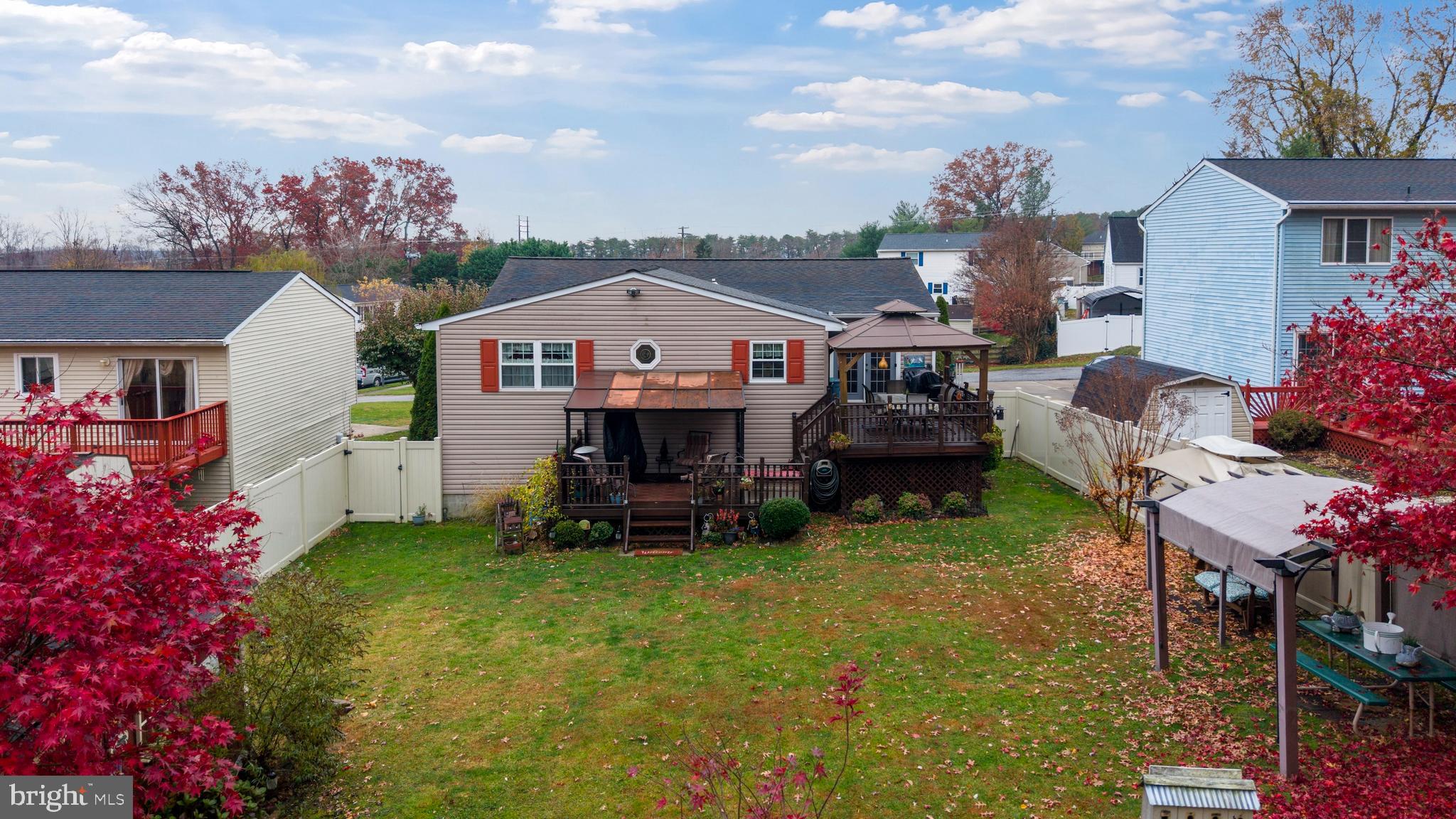 14 Stable Gate Court Perry Hall, MD 21128 - Photo 36 of 46 a view of a house with backyard and sitting area