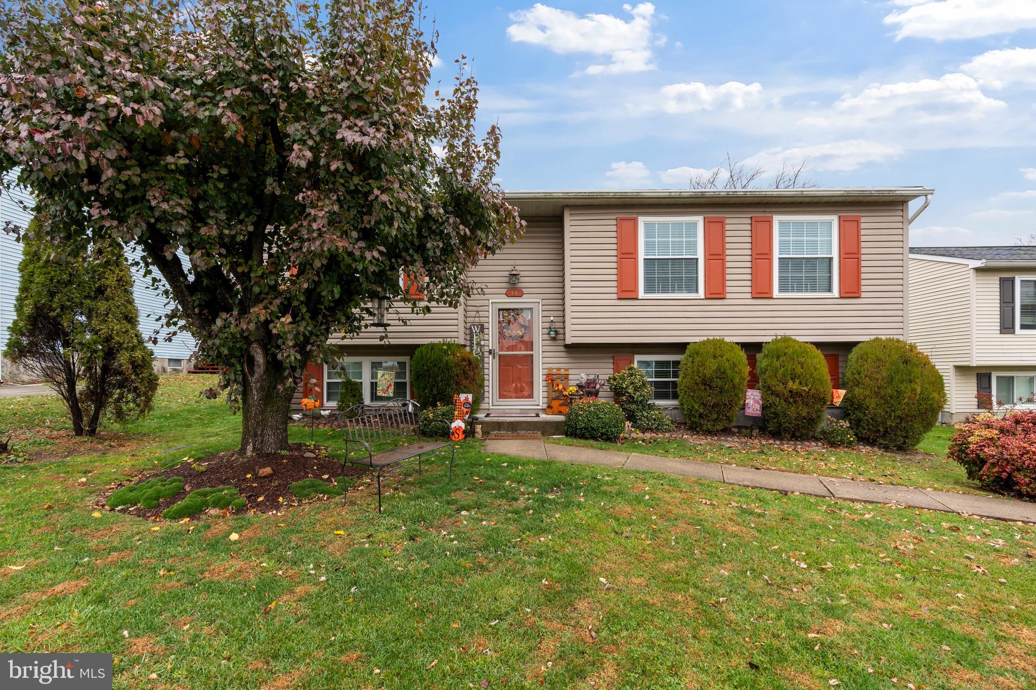14 Stable Gate Court Perry Hall, MD 21128 - Photo 38 of 46 a view of a house with a yard and sitting area
