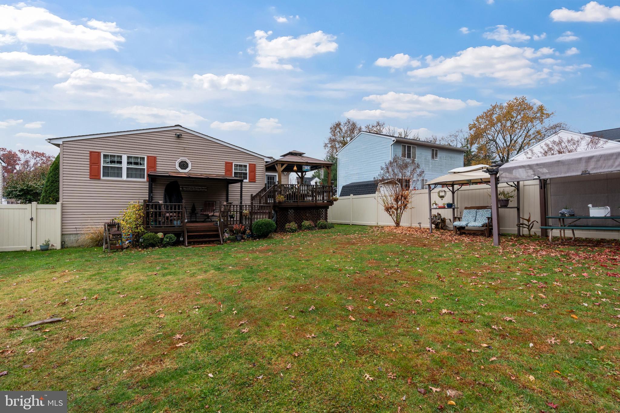 14 Stable Gate Court Perry Hall, MD 21128 - Photo 43 of 46 a front view of a house with a garden and yard