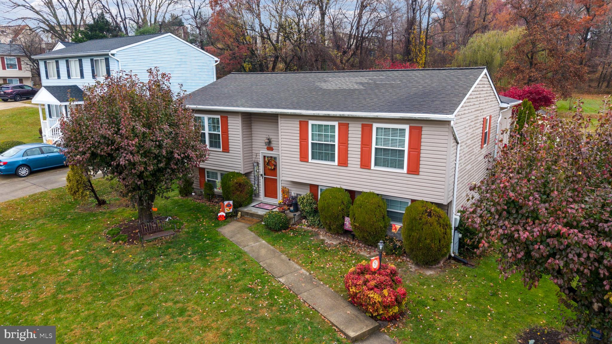 14 Stable Gate Court Perry Hall, MD 21128 - Photo 45 of 46 a view of a house with a yard and a garden