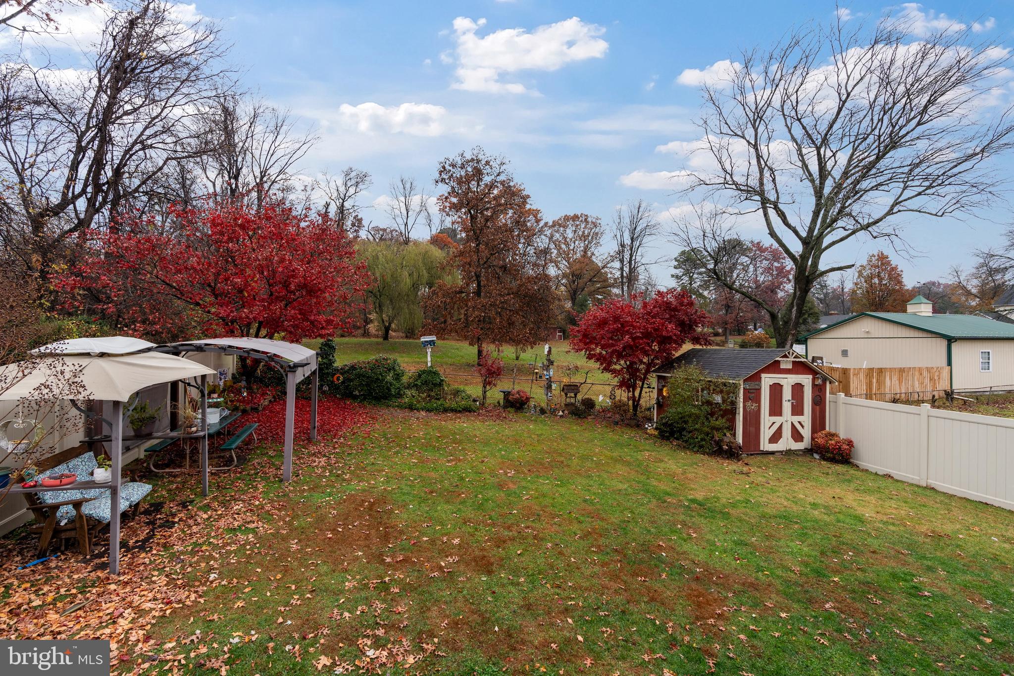 14 Stable Gate Court Perry Hall, MD 21128 - Photo 46 of 46 a view of a house with a yard and sitting area