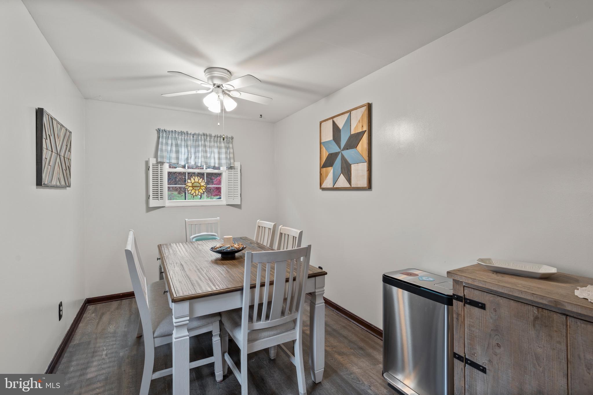 14 Stable Gate Court Perry Hall, MD 21128 - Photo 8 of 46 a dining room with furniture and chandelier fan