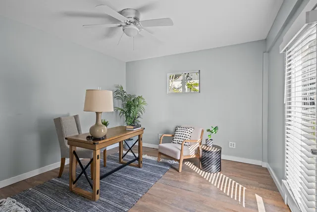 a living room with furniture and a window