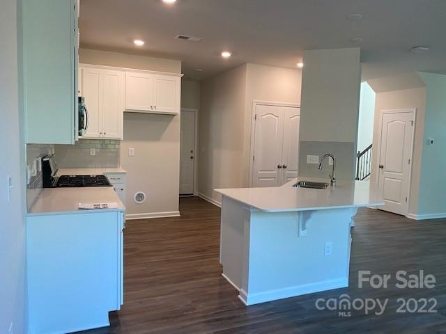 6550 Gopher Road, Unit 331 Lancaster, SC 29720 - Photo 4 of 12 a kitchen with stainless steel appliances granite countertop a sink a stove a refrigerator and a oven