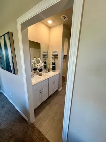 a bathroom with a tub and shower