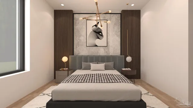 a bedroom with a bed and a painting on the wall