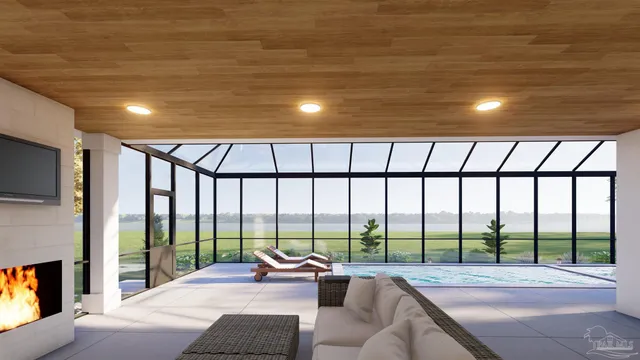 a living room with furniture tv and a large window