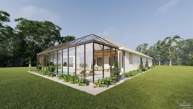 a view of a house with backyard and garden